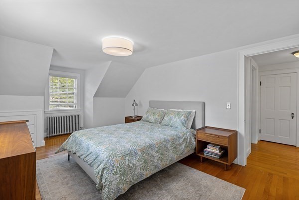 24 Pine Hill Circle Wakefield, MA 01880 - Photo 21 of 34 a bedroom with a bed and a window