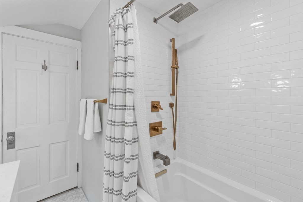 24 Pine Hill Circle Wakefield, MA 01880 - Photo 27 of 34 a bathroom with a bathtub and shower