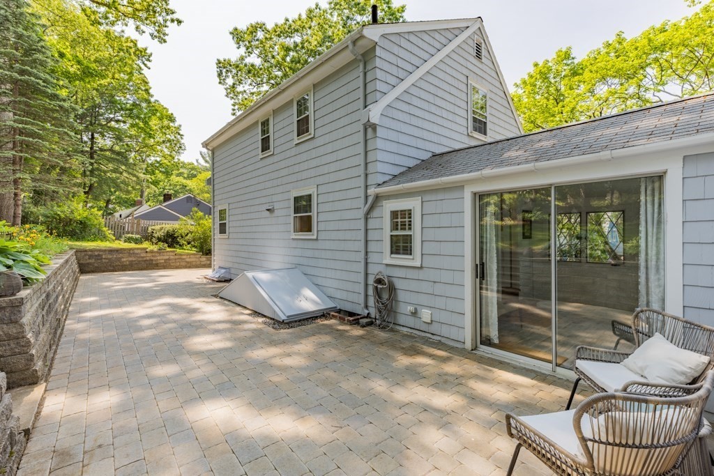 24 Pine Hill Circle Wakefield, MA 01880 - Photo 30 of 34 a view of backyard with outdoor seating and plants