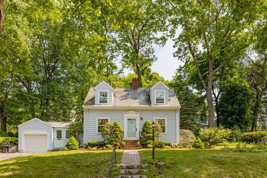 24 Pine Hill Circle Wakefield, MA 01880 - Photo 4 of 34 a front view of a house with garden