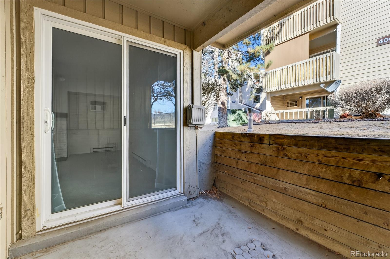 4066 South Atchison Way, Unit 101 Aurora, CO 80014 - Photo 22 of 36 a view of a house with a door