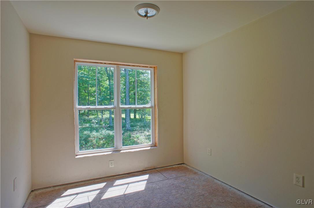 600 Henry's Crossing Road Cresco, PA 18326 - Photo 34 of 39 an empty room with a window