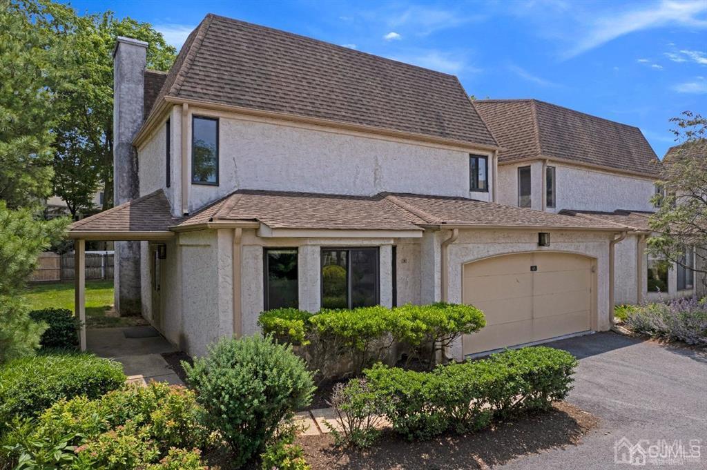 48 Park Gate Drive Edison, NJ 08820 - Photo 1 of 35 front view of a house with a garden