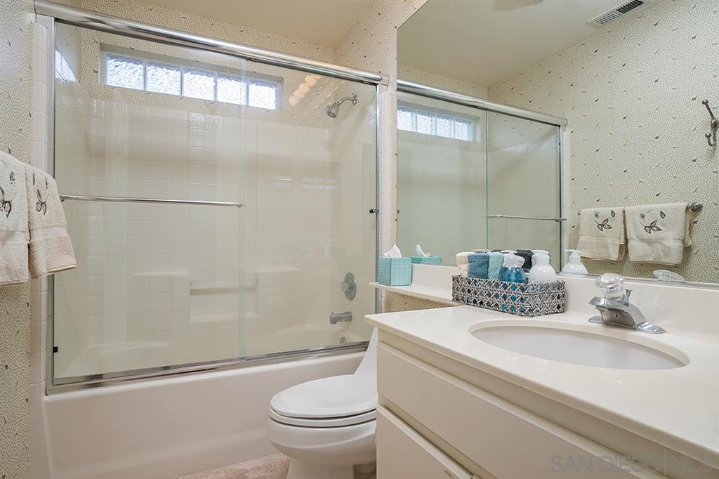 2750 Lobelia Road Alpine, CA 91901 - Photo 12 of 25 a bathroom with a sink toilet and shower