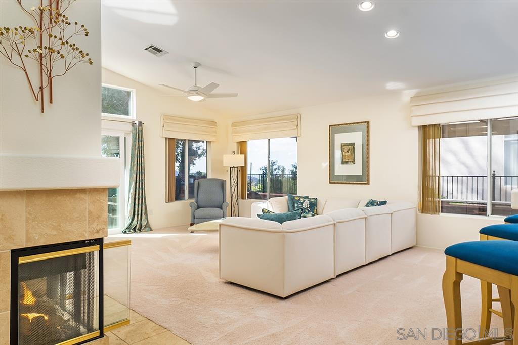 2750 Lobelia Road Alpine, CA 91901 - Photo 3 of 25 a living room with furniture and large windows