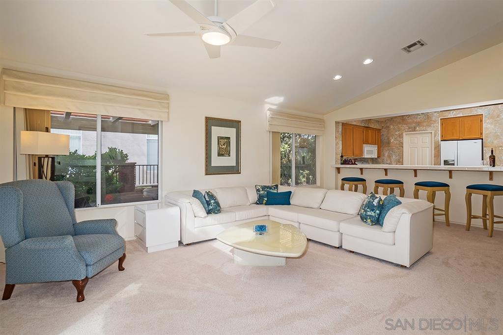 2750 Lobelia Road Alpine, CA 91901 - Photo 5 of 25 a living room with fireplace furniture and a large window