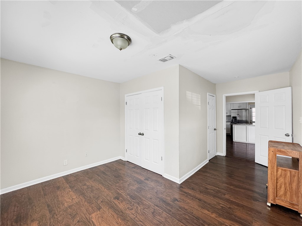 1034 Mc Clendon Street Corpus Christi, TX 78404 - Photo 11 of 19 a view of empty room with wooden floor