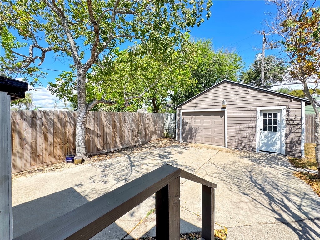 1034 Mc Clendon Street Corpus Christi, TX 78404 - Photo 15 of 19 a view of a house with a yard covered in snow
