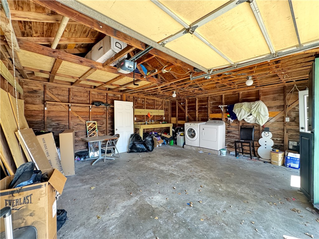 1034 Mc Clendon Street Corpus Christi, TX 78404 - Photo 19 of 19 a view of a storage room with a table and chairs