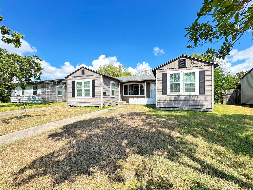 1034 Mc Clendon Street Corpus Christi, TX 78404 - Photo 2 of 19 a view of a house with a swimming pool