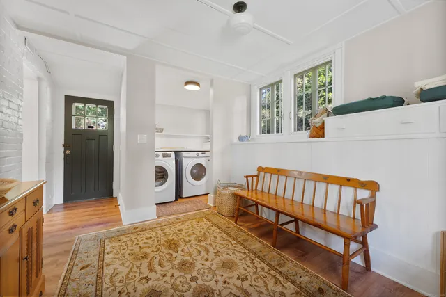a spacious bedroom with a bed and a window