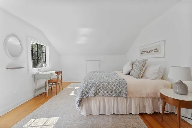 a room with furniture and a book shelf