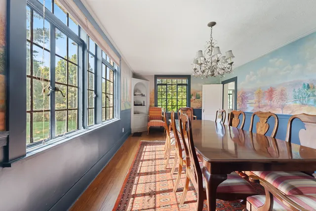 a view of a balcony with furniture