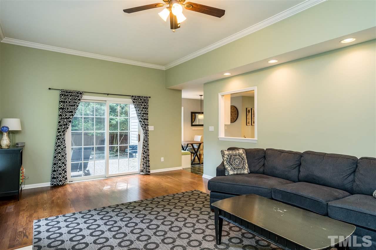 3316 Stone Castle Court Raleigh, NC 27613 - Photo 14 of 25 a living room with furniture and a window