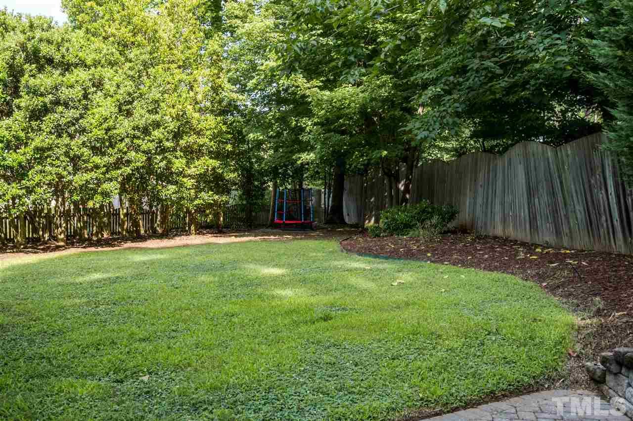 3316 Stone Castle Court Raleigh, NC 27613 - Photo 25 of 25 a view of a backyard
