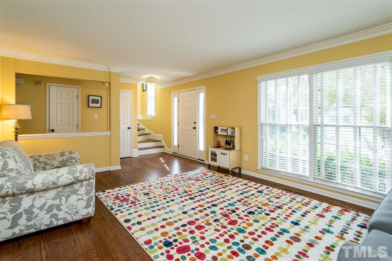 3316 Stone Castle Court Raleigh, NC 27613 - Photo 5 of 25 a bedroom with furniture and a large window