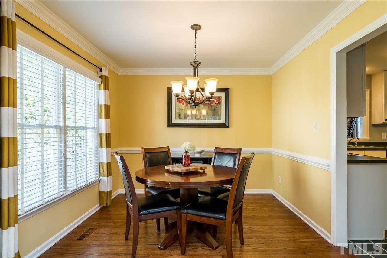 3316 Stone Castle Court Raleigh, NC 27613 - Photo 7 of 25 a dining room with furniture and window