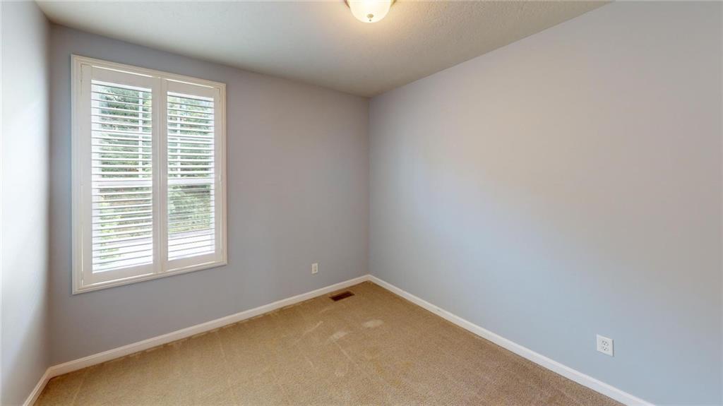 138 Watson Drive Warrendale, PA 15086 - Photo 11 of 24 an empty room with a window