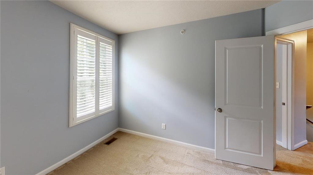 138 Watson Drive Warrendale, PA 15086 - Photo 14 of 24 a view of an empty room with a window
