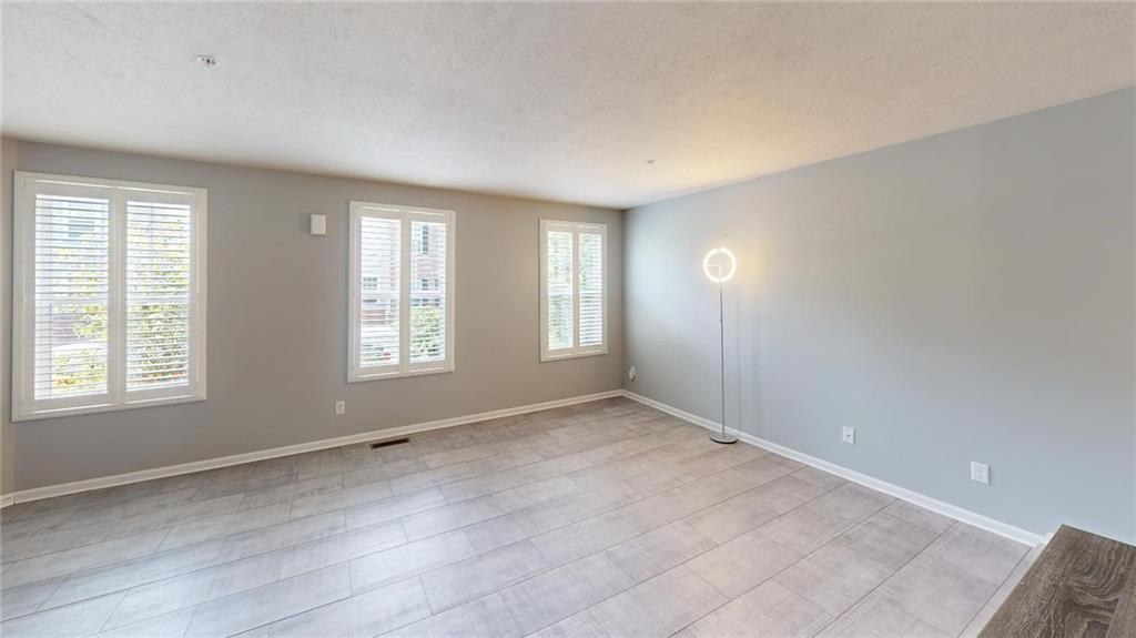 138 Watson Drive Warrendale, PA 15086 - Photo 10 of 24 a view of an empty room with a window