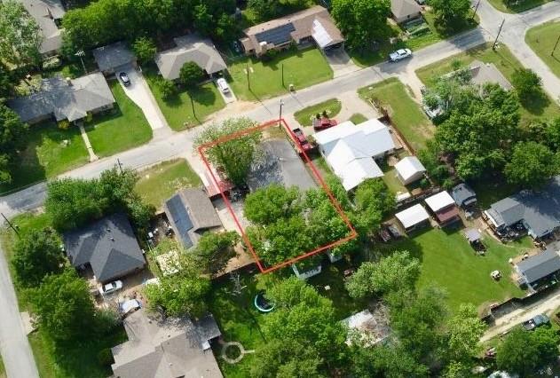 417 South Prairie Street Pilot Point, TX 76258 - Photo 2 of 7 an aerial view of residential house with outdoor space and swimming pool