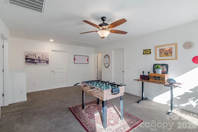 a living room with furniture and window