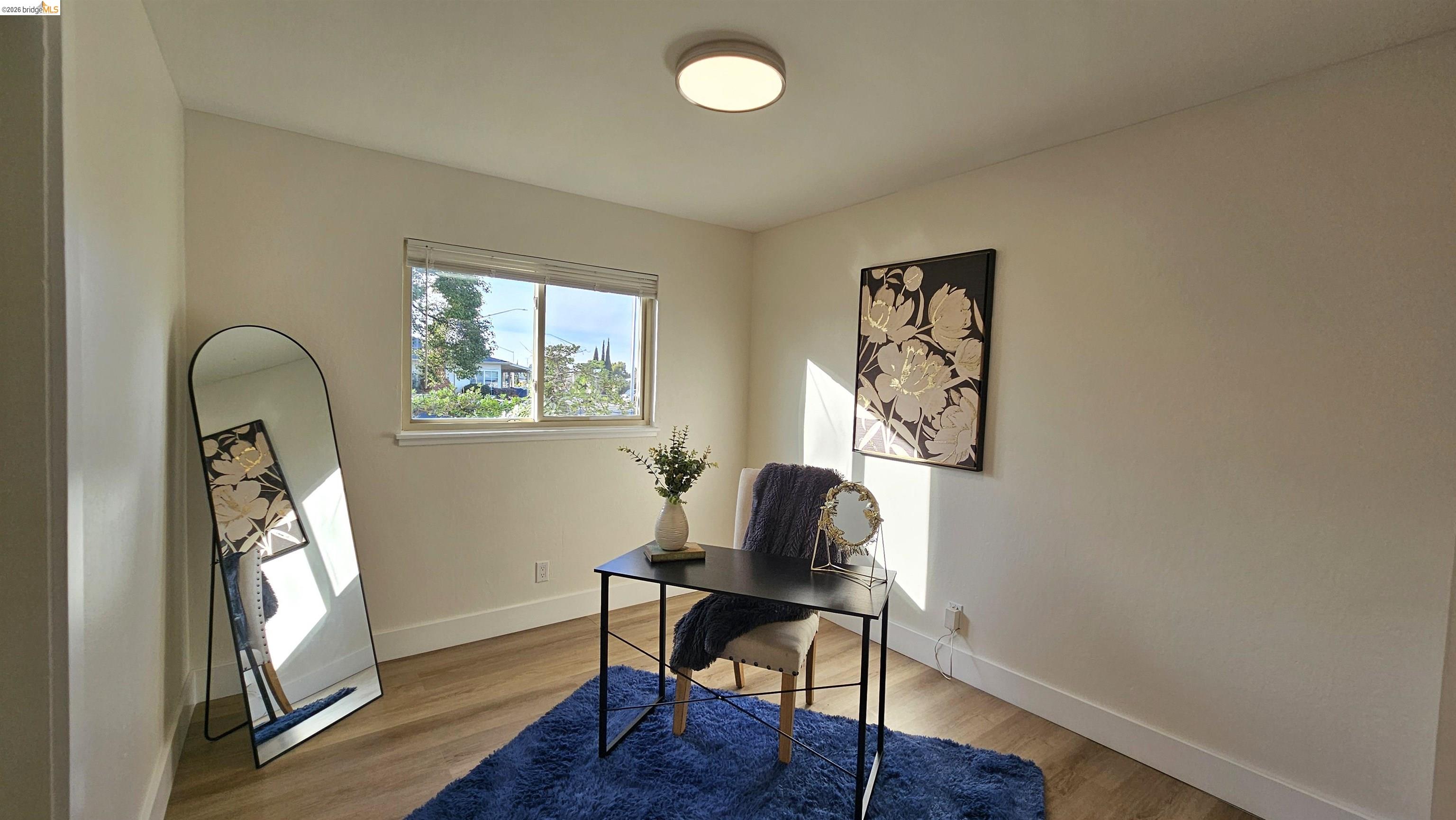 95 West Leland Road Pittsburg, CA 94565 - Photo 18 of 25 a workspace room with furniture and a window