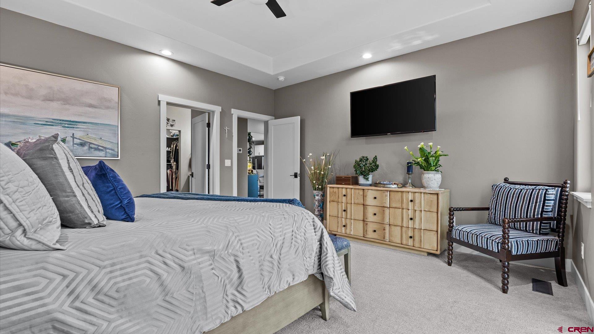 67190 Sunnyside Road Montrose, CO 81401 - Photo 25 of 41 a bedroom with a bed and a flat screen tv