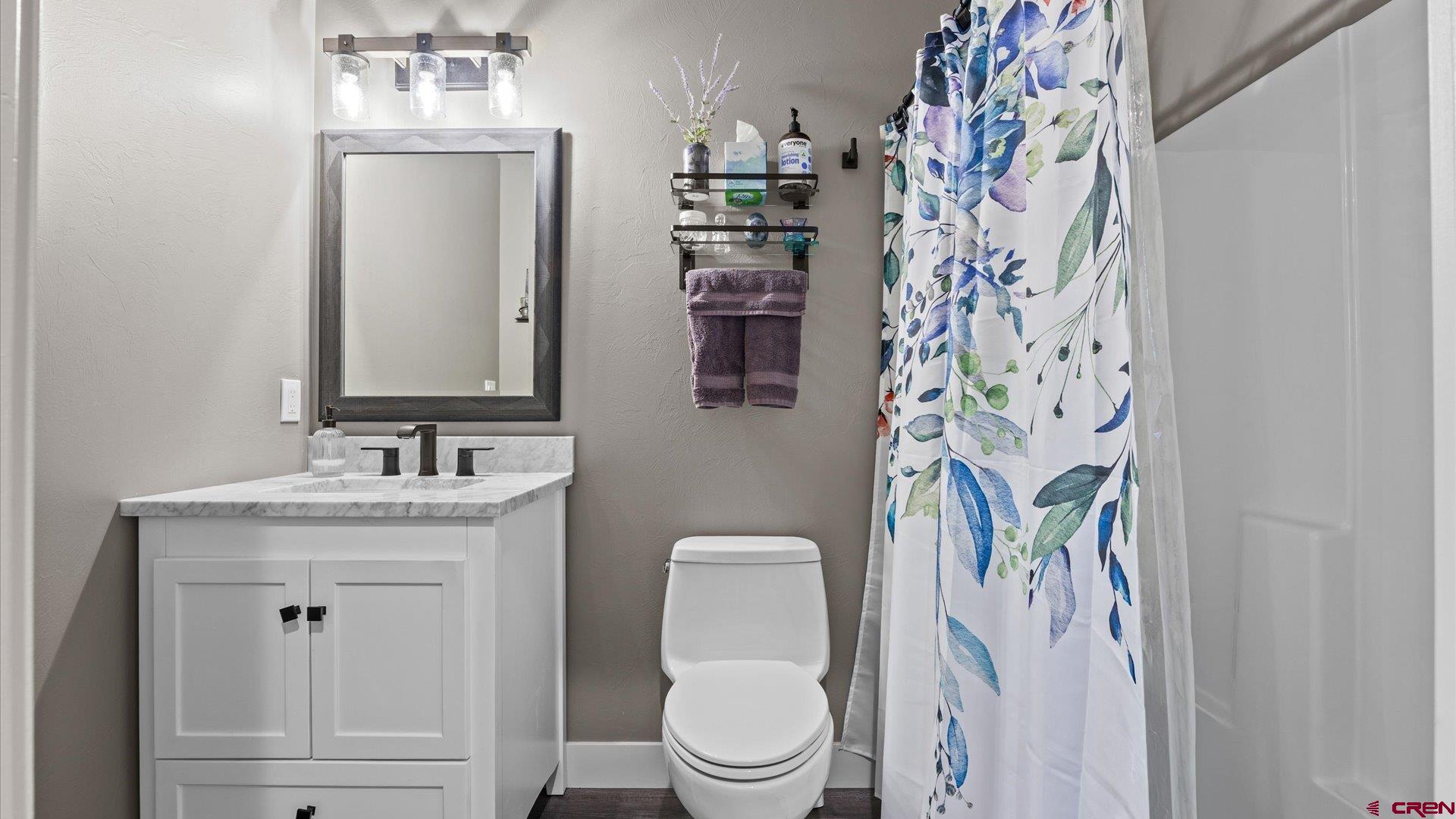67190 Sunnyside Road Montrose, CO 81401 - Photo 28 of 41 a bathroom with a toilet and a sink
