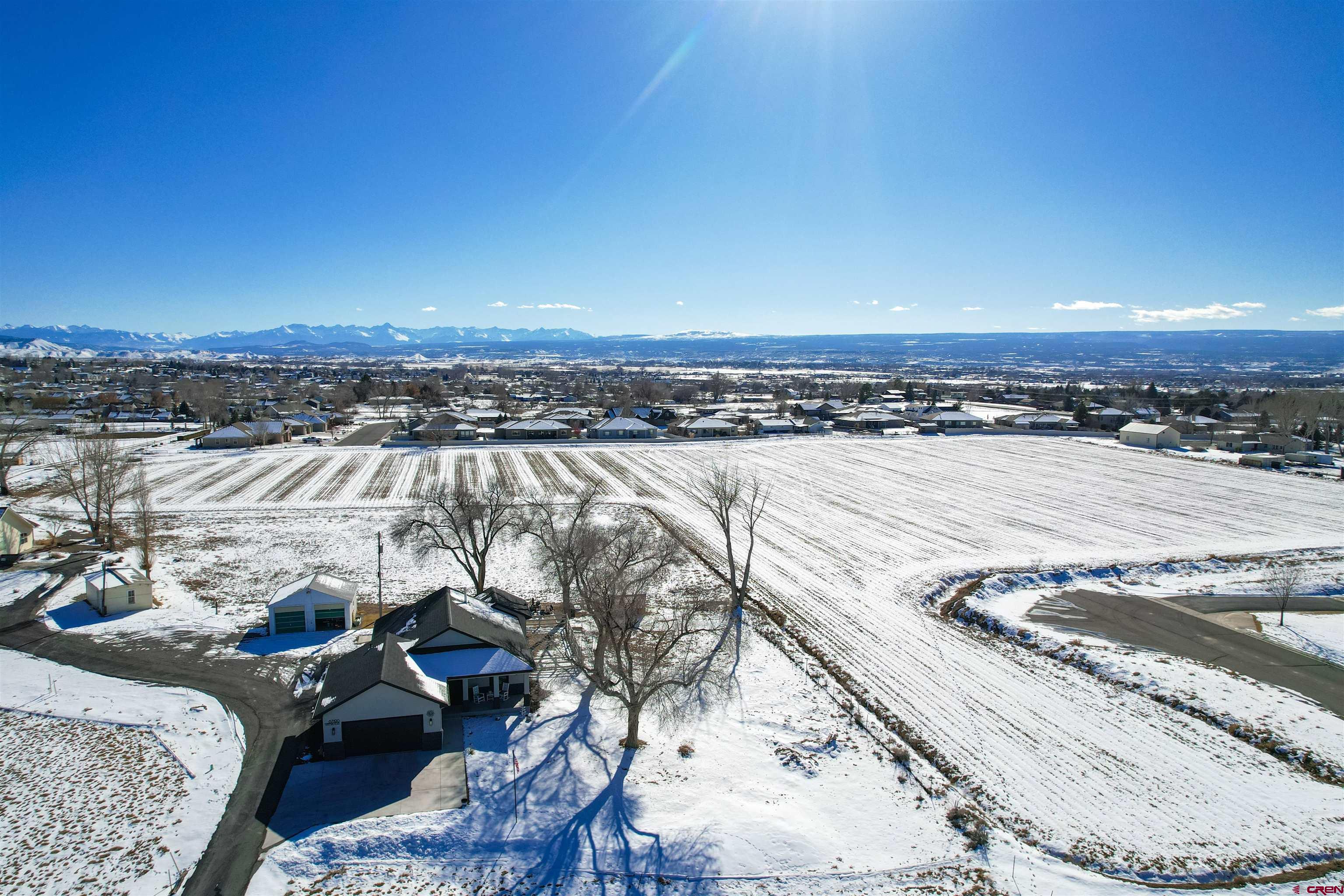 67190 Sunnyside Road Montrose, CO 81401 - Photo 38 of 41 a view of a terrace with wooden floor and a ocean view