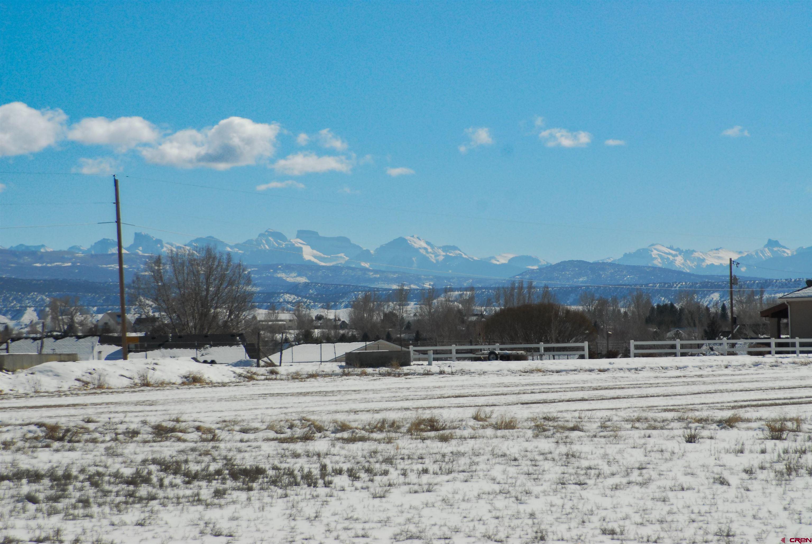 67190 Sunnyside Road Montrose, CO 81401 - Photo 39 of 41 a view of a road with a building in the background