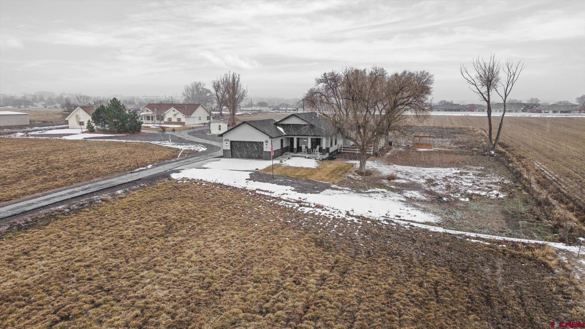 67190 Sunnyside Road Montrose, CO 81401 - Photo 6 of 41 a view of a yard with wooden fence