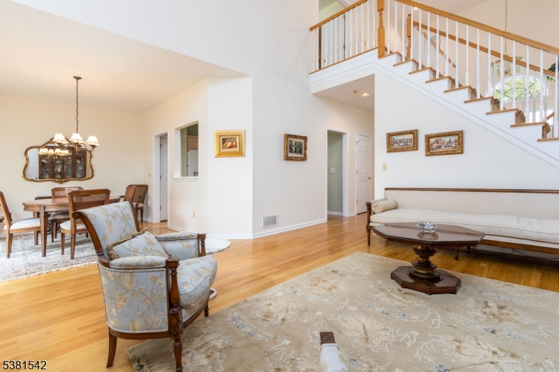 12 Hurlingham Club Road Far Hills, NJ 07931 - Photo 12 of 31 a living room with furniture and a table