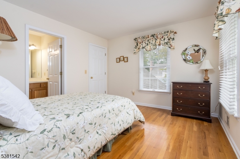 12 Hurlingham Club Road Far Hills, NJ 07931 - Photo 28 of 31 a bedroom with a bed and a dresser