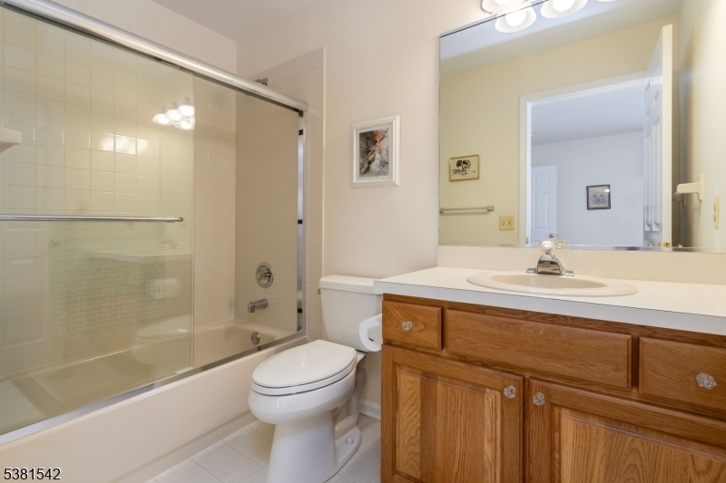 12 Hurlingham Club Road Far Hills, NJ 07931 - Photo 29 of 31 a bathroom with a sink a toilet and shower