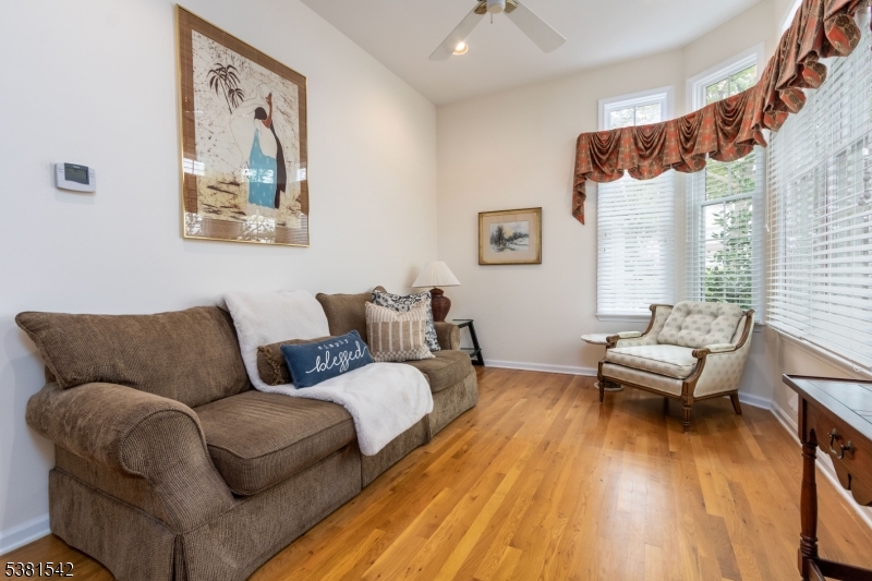 12 Hurlingham Club Road Far Hills, NJ 07931 - Photo 7 of 31 a living room with furniture and wooden floor