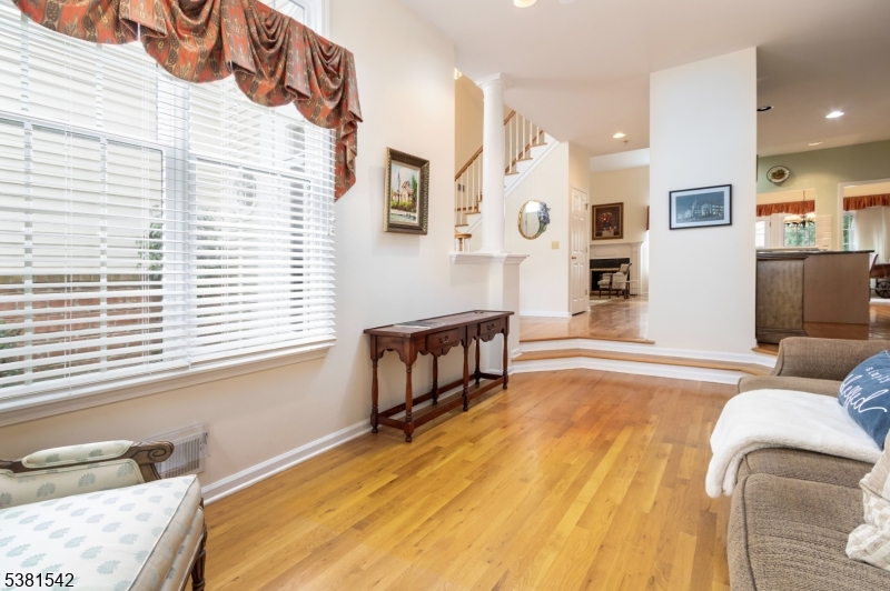 12 Hurlingham Club Road Far Hills, NJ 07931 - Photo 8 of 31 a spacious bedroom with a bed and furniture