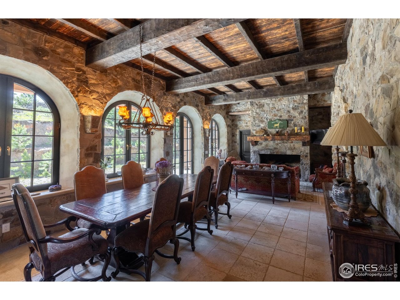 9200 Old Flowers Road Bellvue, CO 80512 - Photo 21 of 50 a view of a dining room with furniture window and outside view