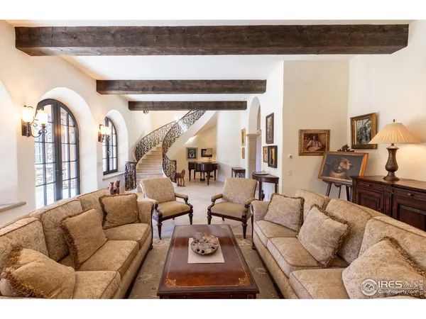 a view of livingroom with furniture and window
