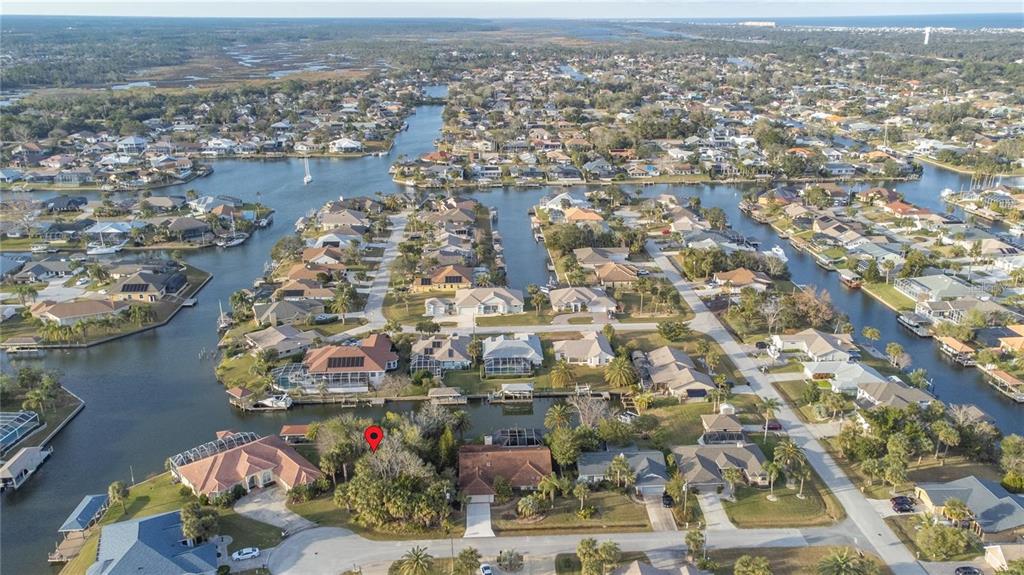 8 Collingville Court Palm Coast, FL 32137 - Photo 3 of 3 an aerial view of residential houses with outdoor space