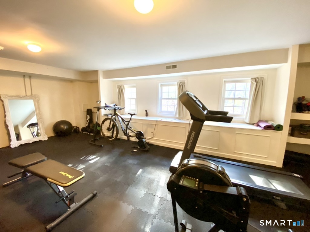 12 Carriage Hill Road Woodbridge, CT 06525 - Photo 24 of 24 a room with gym equipment