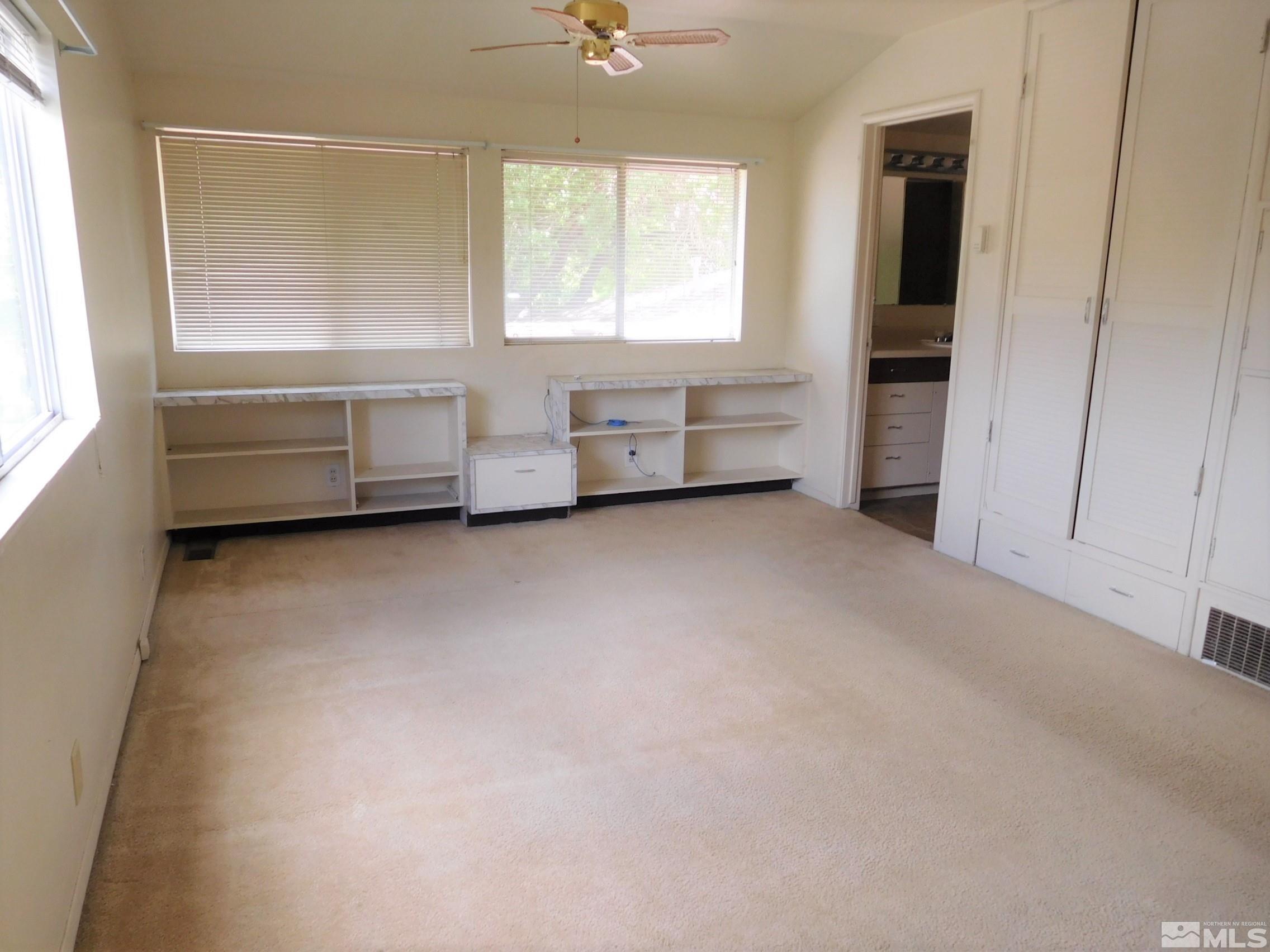 1930 Ives Avenue Reno, NV 89503 - Photo 18 of 20 a view of an empty room with a window