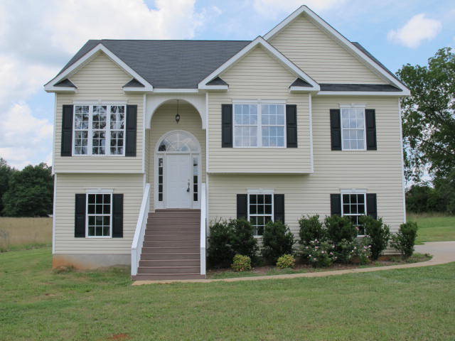 334 Comer Road Gray, GA 31032 - Photo 1 of 1 a front view of a house with a yard