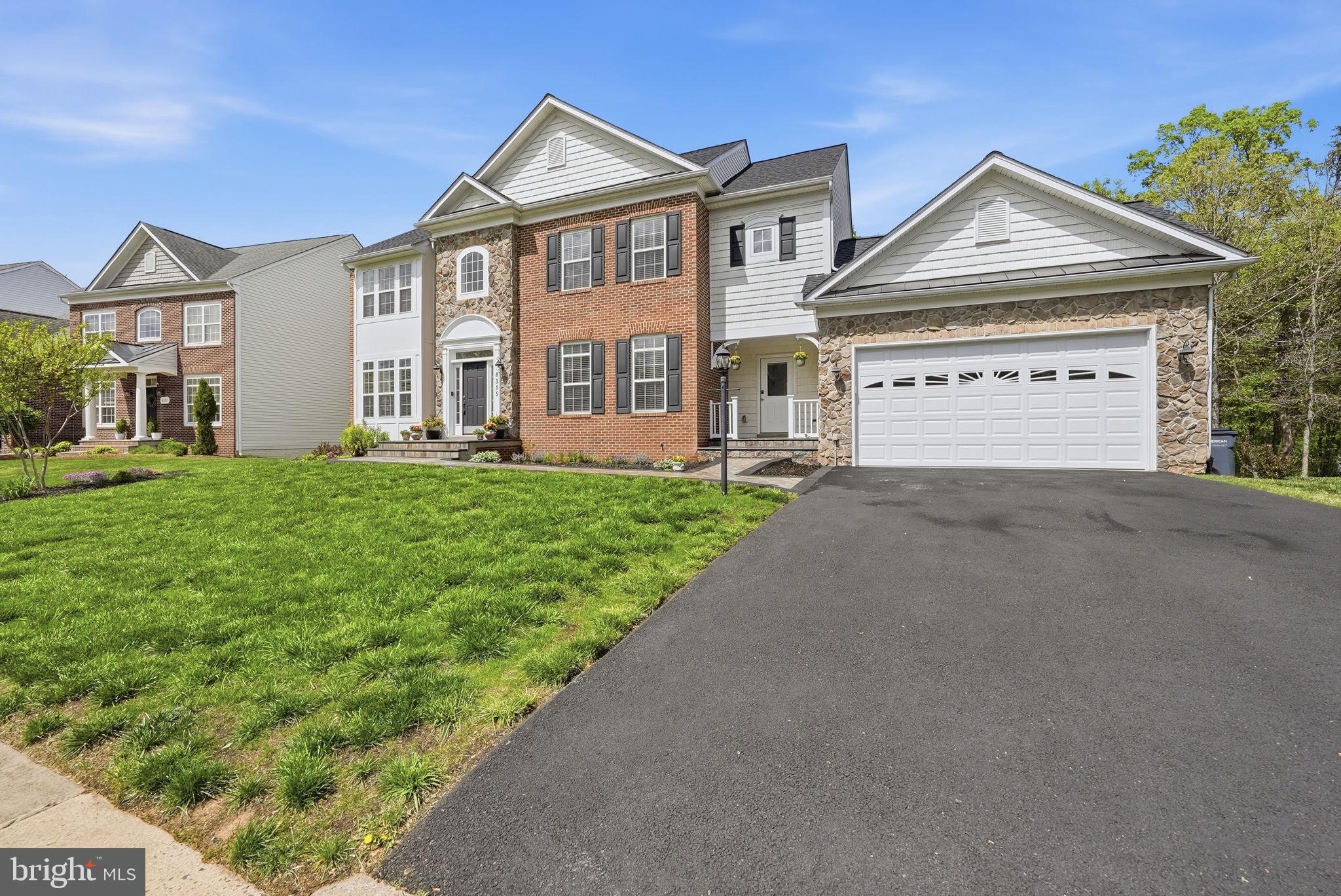 8315 Shimmering Rock Road Gainesville, VA 20155 - Photo 6 of 55 Front Exterior - Driveway