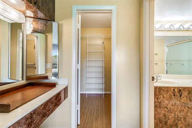 a view of a bathroom with a tub and a sink