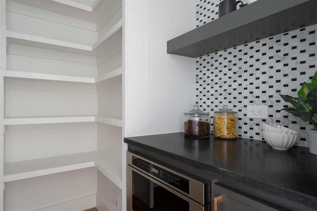 2971 Kosse Court Grapevine, TX 76051 - Photo 12 of 39 a kitchen with a sink and cabinets