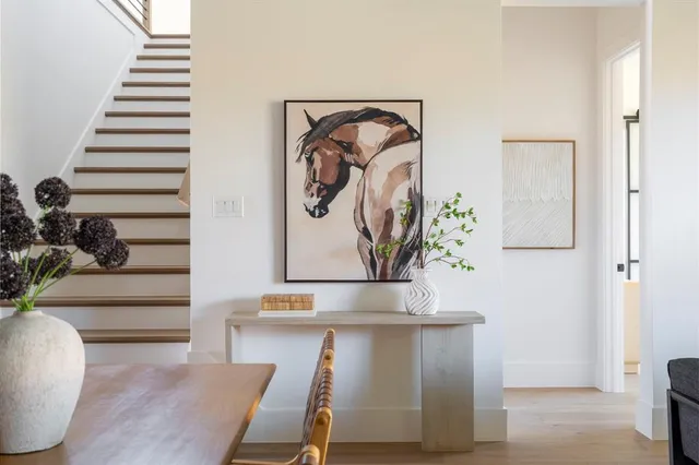 a view of entryway with wooden floor