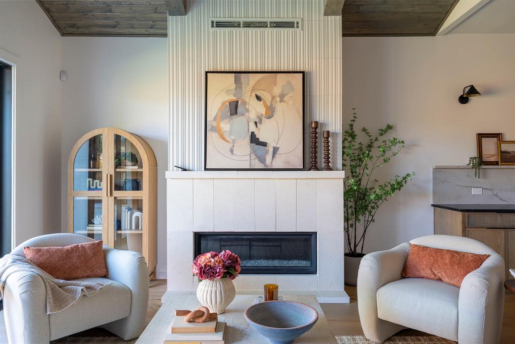 2971 Kosse Court Grapevine, TX 76051 - Photo 16 of 39 a living room with furniture and a fireplace