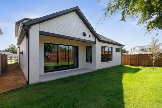a front view of a house with yard