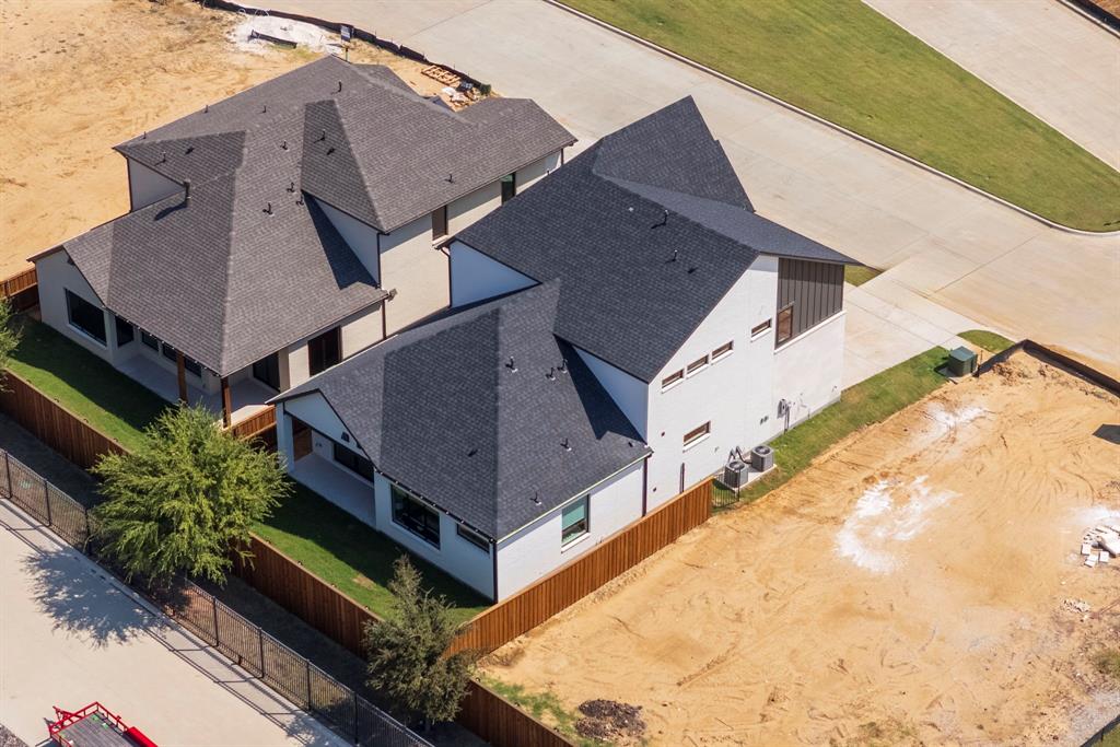 2971 Kosse Court Grapevine, TX 76051 - Photo 39 of 39 a aerial view of a house with a large window and potted plants